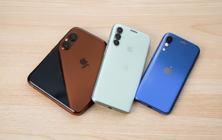 Three modern smartphones fanned out, showing eSIM-compatible phones for 2026